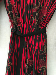 Robe midi 70´s à fleurs, made in France , ouverture au dos , taille 34/36