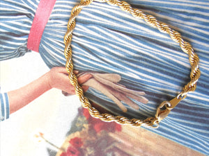 bracelet vintage 80's torsadé en métal doré, taille unique